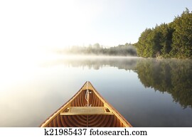 Canoeing on a Misty Lake Canoeing on a Misty Lake