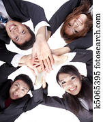 Asian Young Business people joining their hands