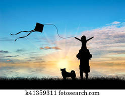 Young dad with child and dog playing with kite near sea Young dad with child and dog playing with kite near sea