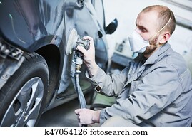 auto repairman grinding automobile car body auto repairman grinding automobile car body
