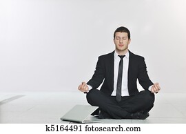 business man practice yoga at network server room