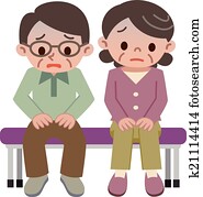 Uneasy senior couple