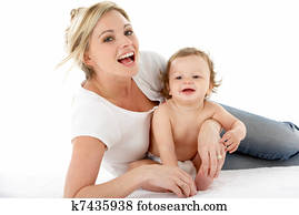 Studio Portrait Of Mother With Young Baby Boy