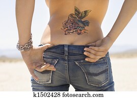 Tattoo and derriere.