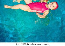 Child in a swimming pool Child in a swimming pool
