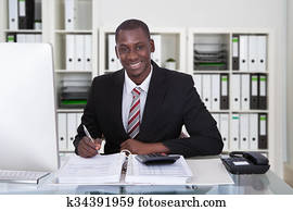 Businessman Calculating Finance