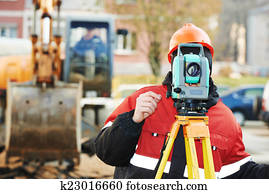 surveyor works with theodolite