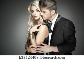 Handsome man hugging his sensual wife Handsome man hugging his sensual wife