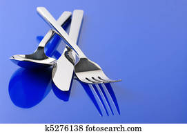 Silverware on blue