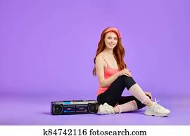 beautiful ginger girl with glowing skin relaxing after aerobics beautiful ginger girl with glowing skin relaxing after aerobics