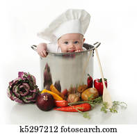 Licking baby sitting in a chef's pot 