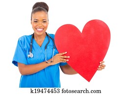 african american healthcare worker with heart symbol