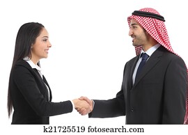 Side view of an arab saudi businesspeople handshaking