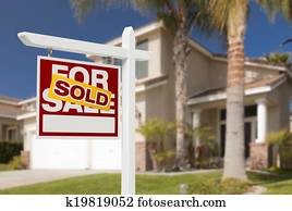 Sold Home For Sale Sign in Front of New House