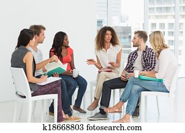 Therapist speaking to a rehab group Therapist speaking to a rehab group