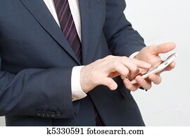 Typing on cell phone Typing on cell phone