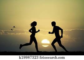 Girl and boy running 
