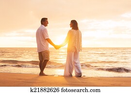 Mature Couple Enjoying Sunset