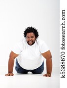 funny african man lying on floor