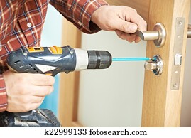 carpenter at door lock installation carpenter at door lock installation