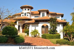 Spanish style home with tower