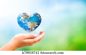 Earth Day concept: hand hold Earth in Heart shape on Natural background, Elements of this image furnished by NASA Earth Day concept: hand hold Earth in Heart shape on Natural background, Elements of this image furnished by NASA