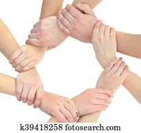 Business people joining hands in a circle in the office
