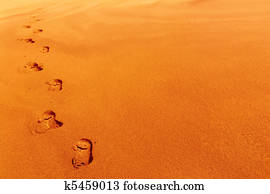 Footprints on sand dune