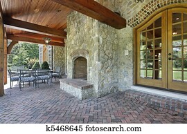ladrillo, patio, con, piedra, chimenea