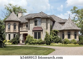 Luxury stone home with turret