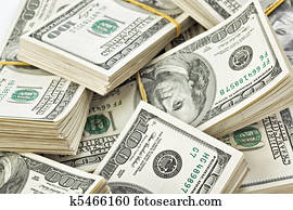 Many  bundle of US 100 dollars bank notes 