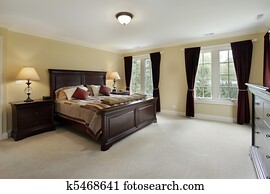 Master bedroom with mahogany furniture Master bedroom with mahogany furniture