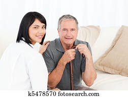 Nurse with her patient looking at t