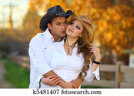 Cowboy and Cowgirl kissing Cowboy and Cowgirl kissing