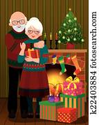 An elderly couple in the fireplace 