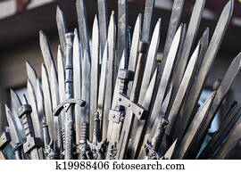 throne made of swords in a medieval fair throne made of swords in a medieval fair