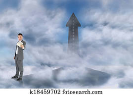 Composite image of businessman pres