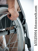hand on wheelchair