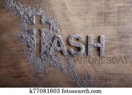 Ash wednesday word written in ash and christian cross symbol as a religion concept
