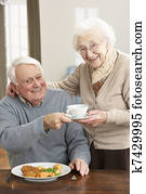 Senior Couple Enjoying Meal Together Senior Couple Enjoying Meal Together