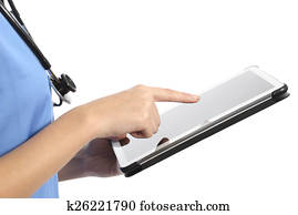 Side view of a nurse or doctor hand using a tablet