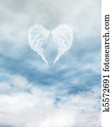 Angel Wings in Cloudy Blue Sky
