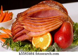 Honey glazed Easter ham with fruit and carrots Honey glazed Easter ham with fruit and carrots