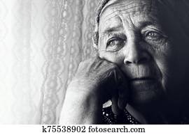 Depressed sad old woman