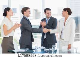 Handshake to seal a deal after a job recruitment meeting Handshake to seal a deal after a job recruitment meeting