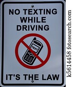 No texting while driving, its the law sign