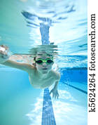 little boy swimming underwater little boy swimming underwater