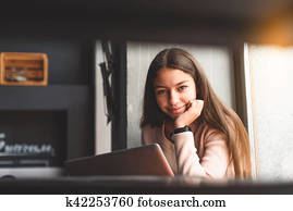 Girl in good mood and smiling brightly