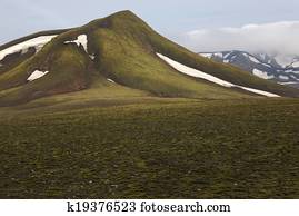 Iceland. South area. Fjallabak. Volcanic landscape with snow.