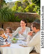 Family eating in the garden